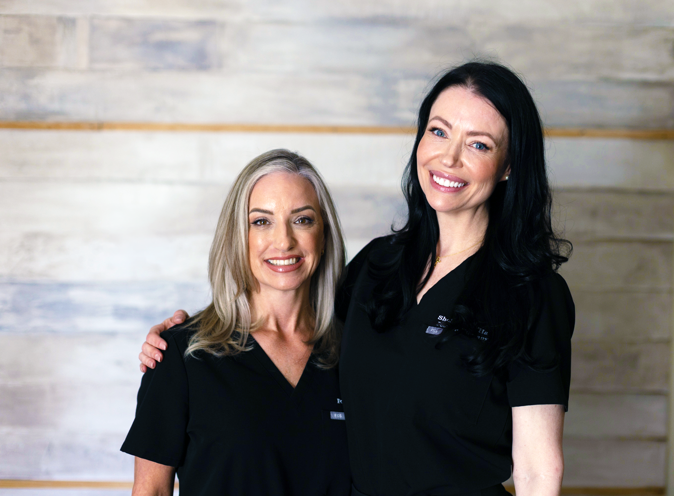 Shelby and Rosa of Post Op Therapy, smiling together